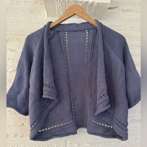 Hand knit sweater cardigan with rolled hem finishing periwinkle. Beautiful.